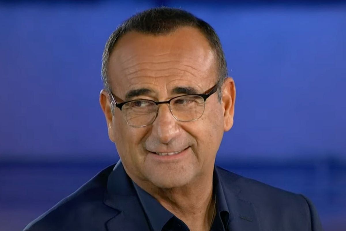 carlo conti perché è sempre abbronzato